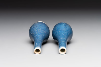 A pair of Chinese blue-glazed 'Hatcher Cargo' bottle vases with incised dragons, Transitional period