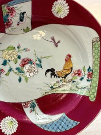 A pair of Chinese famille rose ruby-ground 'scrolls and rooster' plates, Yongzheng