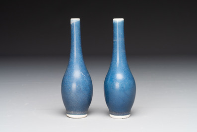 A pair of Chinese blue-glazed 'Hatcher Cargo' bottle vases with incised dragons, Transitional period