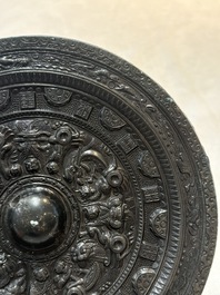 A Chinese finely cast 'immortals' bronze mirror, Wu Zuo Ming Jing 吾作明鏡 mark, Eastern Han