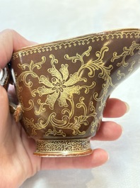 A Chinese gilt-decorated brown-glazed libation cup with a chilong-form handle, Qianlong mark and of the period