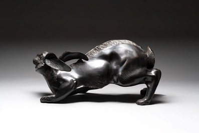 A large Japanese bronze sculpture of a reclining hare, 20th C.