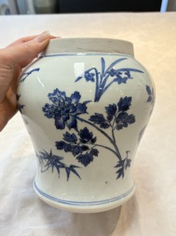 A Chinese blue and white vase with floral design, Transitional period