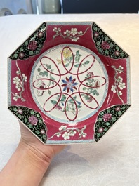 A pair of Chinese famille rose ruby-ground octagonal plates with floral design, Yongzheng