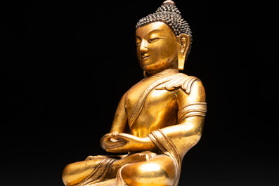 A fine Sino-Tibetan gilt-bronze figure of Buddha Shakyamuni, 17th C.