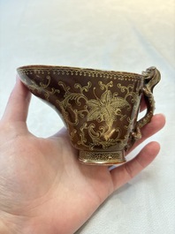 A Chinese gilt-decorated brown-glazed libation cup with a chilong-form handle, Qianlong mark and of the period