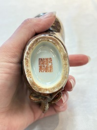 A Chinese gilt-decorated brown-glazed libation cup with a chilong-form handle, Qianlong mark and of the period