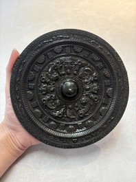 A Chinese finely cast 'immortals' bronze mirror, Wu Zuo Ming Jing 吾作明鏡 mark, Eastern Han