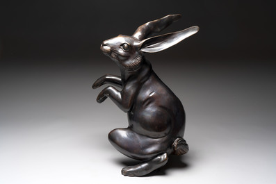 A large Japanese bronze sculpture of a sitting hare, 20th C.