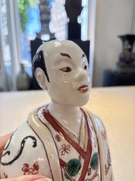 A Japanese Arita Imari figure of a samurai dressed in a kimono, Edo, 17/18th C.