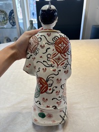 A Japanese Arita Imari figure of a samurai dressed in a kimono, Edo, 17/18th C.