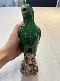 A pair of Chinese verte biscuit models of parrots, Kangxi