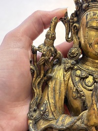 An extremely rare and fine Chinese gilt-bronze Buddha, inscribed 大明正統己未金川比丘昌靜捐資命工造, Zhengtong mark and of the period, dated 1439