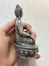 A fine Nepalese silver Buddha, 20th C.