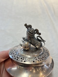 A Vietnamese or Chinese silver tripod censer and cover, 19/20th C.