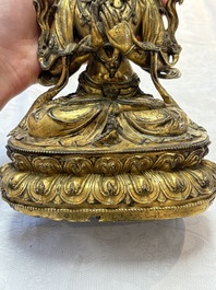 An extremely rare and fine Chinese gilt-bronze Buddha, inscribed 大明正統己未金川比丘昌靜捐資命工造, Zhengtong mark and of the period, dated 1439