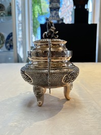 A Vietnamese or Chinese silver tripod censer and cover, 19/20th C.