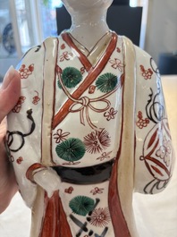 A Japanese Arita Imari figure of a samurai dressed in a kimono, Edo, 17/18th C.