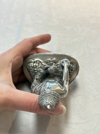 A fine Nepalese silver Buddha, 20th C.