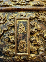 A fine Chinese gilt-bronze 'dragon among clouds' bell, Qianlong mark and of the period, dated 1743