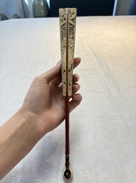 A chinoiserie folding fan, watercolour on paper and bone, France, early 19th C.