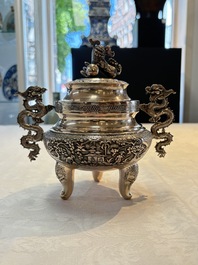 A Vietnamese or Chinese silver tripod censer and cover, 19/20th C.