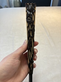 In the manner of Ma Quan 馬荃(18th C.): 'An ebony fan painted with 'Four Gentlemen 四君子', 19/20th C.