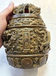A fine Chinese gilt-bronze 'dragon among clouds' bell, Qianlong mark and of the period, dated 1743