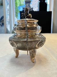 A Vietnamese or Chinese silver tripod censer and cover, 19/20th C.