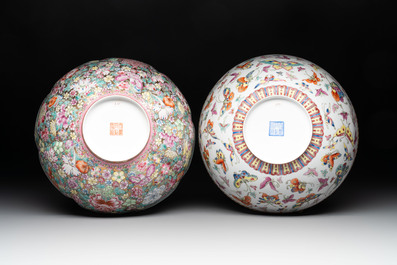 A Chinese coral red-ground vase, a famille rose eggshell vase and two bowls, Qianlong mark, 20th C.