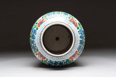 A Chinese wucai 'He He Er Xian' vase on gilt-bronze stand, 19th C.