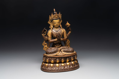 A Tibetan or Nepalese turquoise-inlaid partly-gilt bronze figure of White Tara, 20th C.
