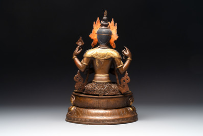 A Tibetan or Nepalese turquoise-inlaid partly-gilt bronze figure of White Tara, 20th C.