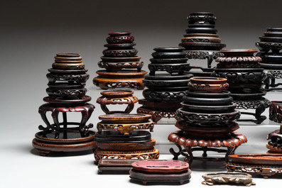 A collection of 51 Chinese wooden stands, 19/20th C.