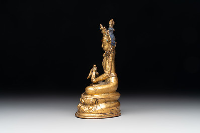 A Sino-Tibetan coral and turquoise-inlaid gilt-bronze Buddha Amitayus, 18th C.