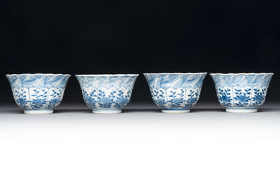 A set of four Chinese blue and white cups and saucers, flower mark, 19th C.