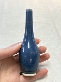 A pair of Chinese blue-glazed 'Hatcher Cargo' bottle vases with incised dragons, Transitional period