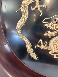 A large Japanese mother-of-pearl and bone-inlaid lacquer 'dragon' dish, Meiji, 19th C.