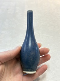 A pair of Chinese blue-glazed 'Hatcher Cargo' bottle vases with incised dragons, Transitional period