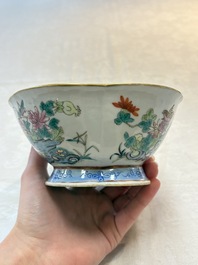 Four Chinese famille rose tazzas, one with a wooden stand, Xianfeng and Tongzhi marks, 19th C.