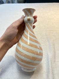 A rare pair of Chinese pear-shaped bottle vases with iron-red swirls, Kangxi