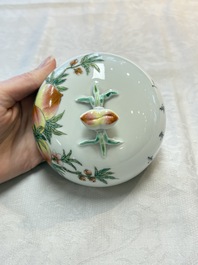 A Chinese wucai covered box, a blue and white ewer, a famille rose covered box and a plate, Wanli, Kangxi and Guangxu mark, 19/20th C.