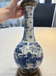 Two Chinese blue and white 'Wen Wang Fang Xian 文王訪賢' and 'Zhu Lin Qi Xian 竹林七賢' vases mounted as lamps, Transitional period