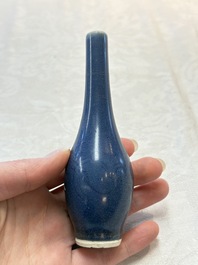 A pair of Chinese blue-glazed 'Hatcher Cargo' bottle vases with incised dragons, Transitional period