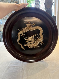 A large Japanese mother-of-pearl and bone-inlaid lacquer 'dragon' dish, Meiji, 19th C.