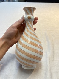 A rare pair of Chinese pear-shaped bottle vases with iron-red swirls, Kangxi
