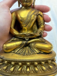 A fine Sino-Tibetan gilt-bronze figure of Buddha Shakyamuni, 17th C.