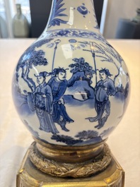 Two Chinese blue and white 'Wen Wang Fang Xian 文王訪賢' and 'Zhu Lin Qi Xian 竹林七賢' vases mounted as lamps, Transitional period