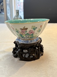 Four Chinese famille rose tazzas, one with a wooden stand, Xianfeng and Tongzhi marks, 19th C.