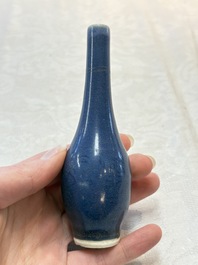 A pair of Chinese blue-glazed 'Hatcher Cargo' bottle vases with incised dragons, Transitional period